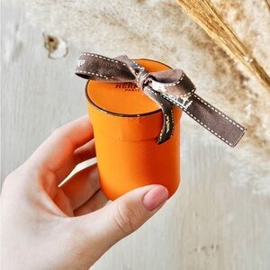 Orange Gift Box with Brown Ribbon